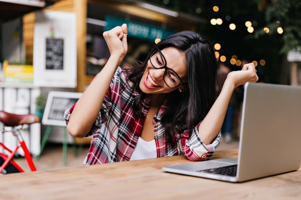 wonderful-female-student-sitting-cafe-with-laptop-laughing-pleasant-freelancer-glasses-expressing-happiness (1)